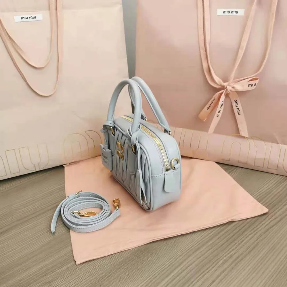 Miu Miu Matelassé Nappa Leather Top-Handle Bag for Women in Silver Miu Miu Matelassé Nappa Leather Top-Handle Bag for Women in Silver