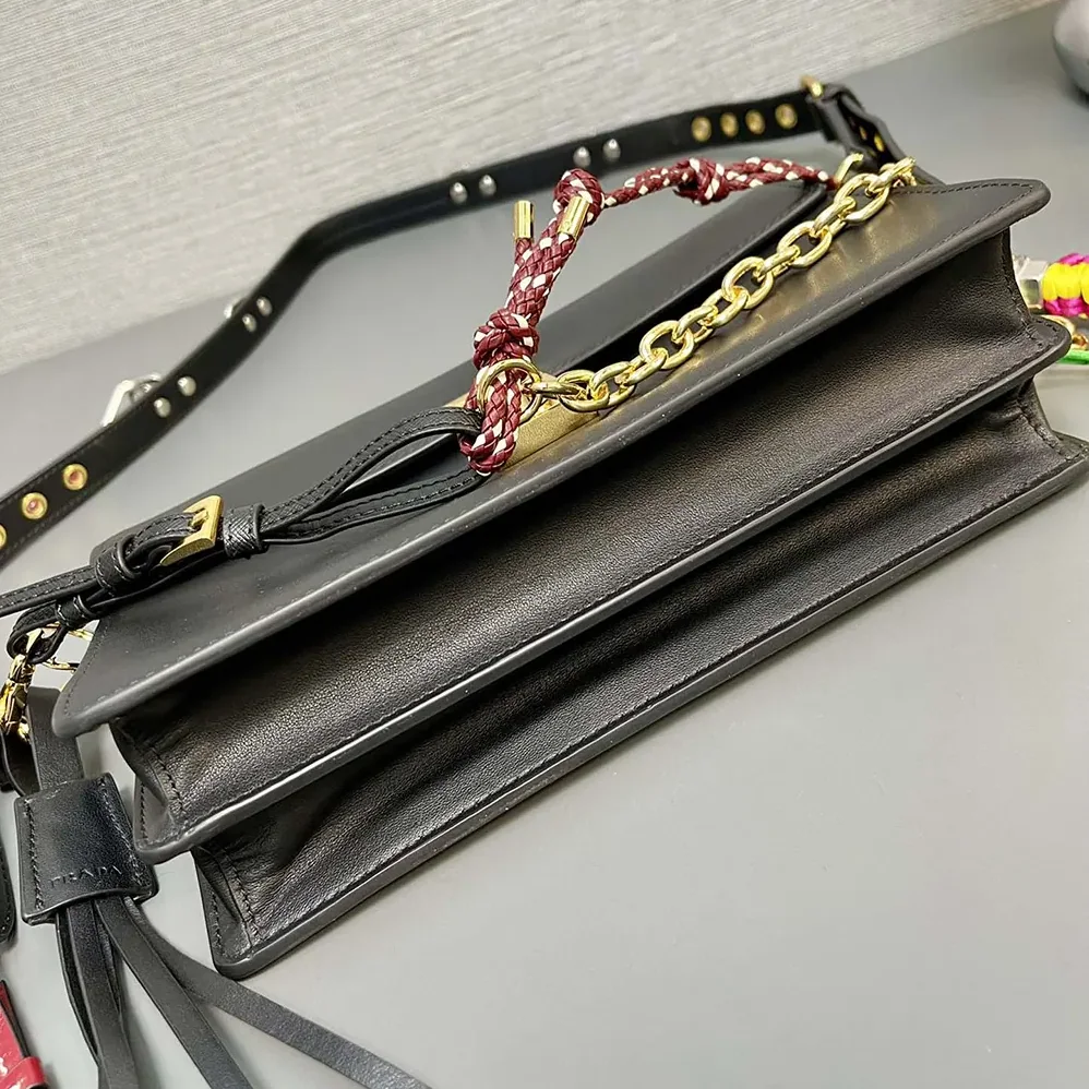 Prada Soft Sound Small Leather Shoulder Bag with Charms for Women in Black
