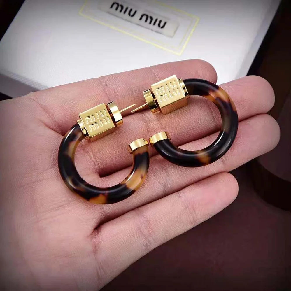 Miu Miu Plexiglas and Metal Earrings for Women Miu Miu Plexiglas and Metal Earrings for Women