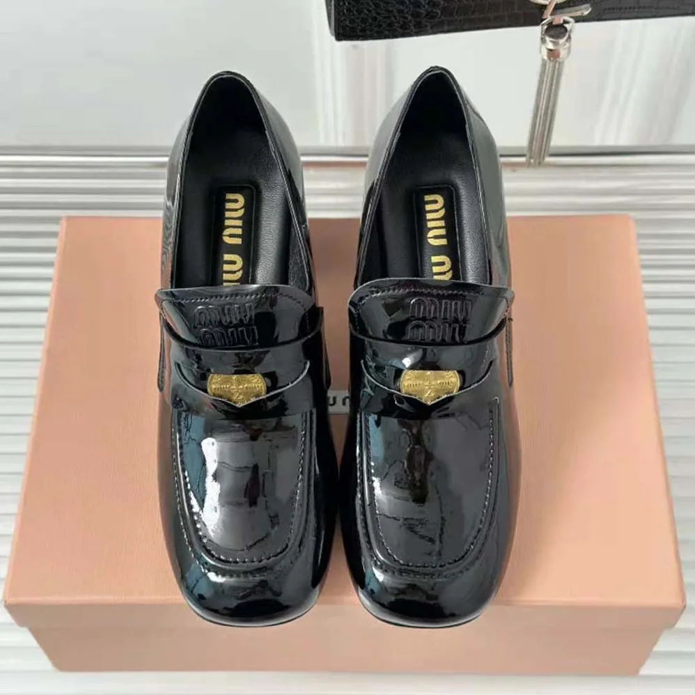 Miu Miu Patent Leather Loafers with Embossed Logo on the Tongue for Women in Black Miu Miu Patent Leather Loafers with Embossed Logo on the Tongue for Women in Black