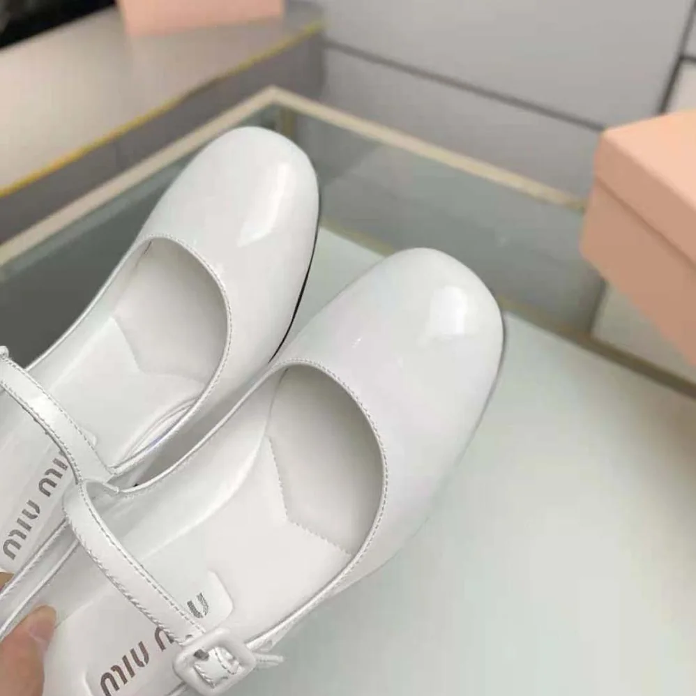 Miu Miu Patent Leather Pumps with Metal Lettering Logo for Women in White Miu Miu Patent Leather Pumps with Metal Lettering Logo for Women in White