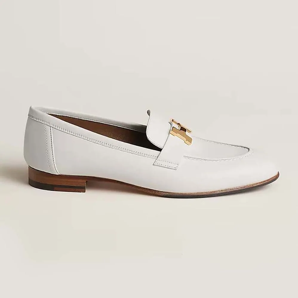 Hermes Paris Loafer in Calfskin with Palladium Plated Signature “H” Detail for Women in White Hermes Paris Loafer in Calfskin with Palladium Plated Signature “H” Detail for Women in White
