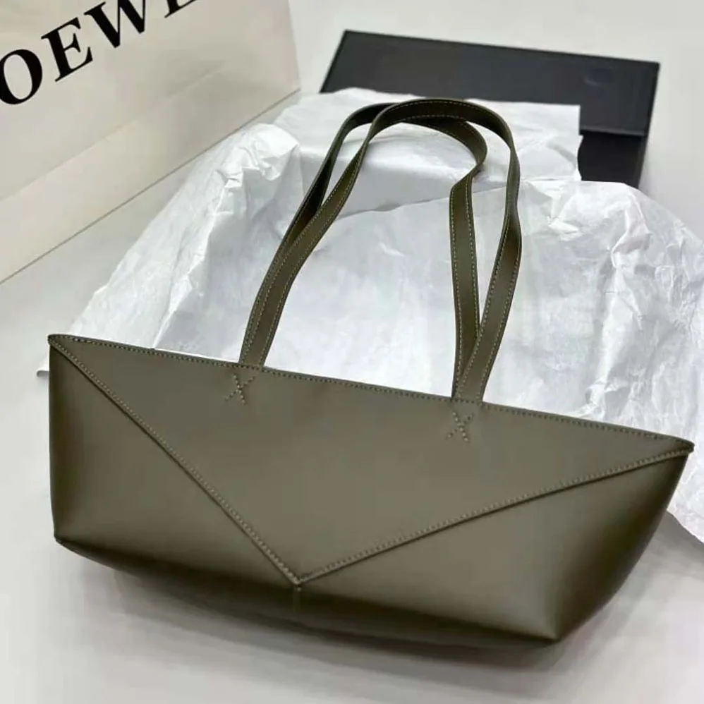 Loewe Cropped Puzzle Fold Bag in Shiny Calfskin for Women in Green Loewe Cropped Puzzle Fold Bag in Shiny Calfskin for Women in Green