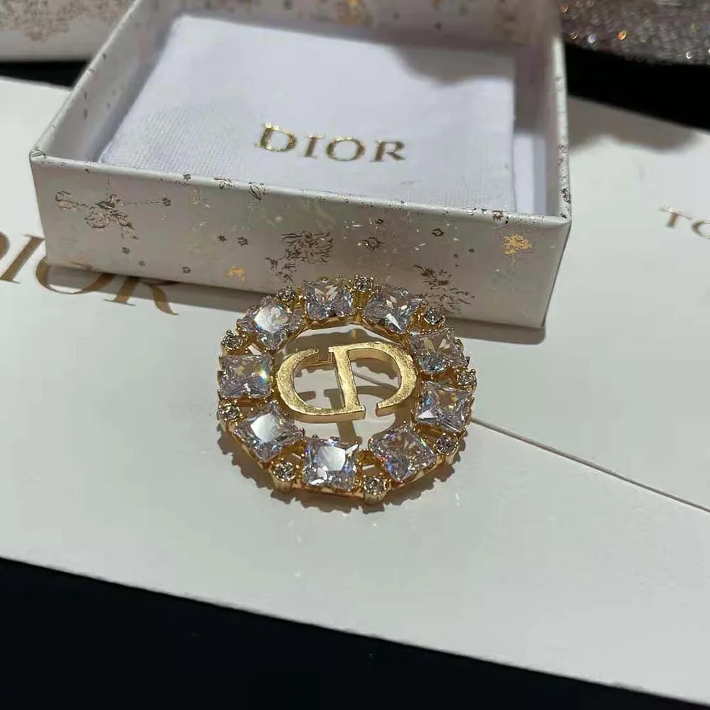 Dior Petit CD Brooch Gold-Finish Metal with White and Silver for Women in Tone Crystals Dior Petit CD Brooch Gold-Finish Metal with White and Silver for Women in Tone Crystals