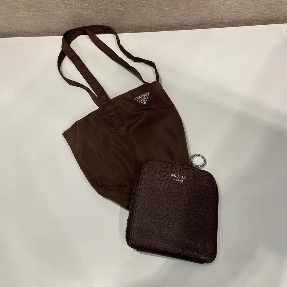 Prada Saffiano Leather Pendant With Re-Nylon Tote Bag for Women in Sienna Prada Saffiano Leather Pendant With Re-Nylon Tote Bag for Women in Sienna
