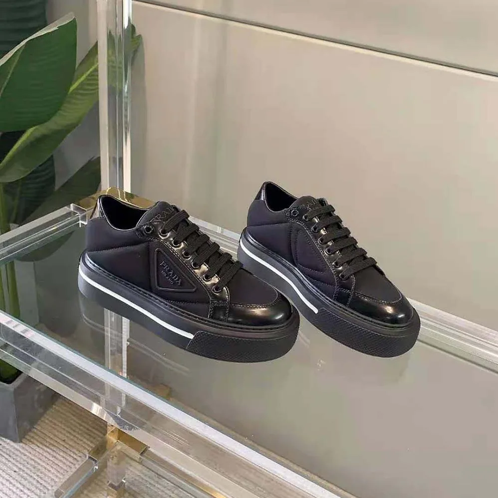 Prada Macro Re-Nylon and Brushed Leather Sneakers for Women in Black