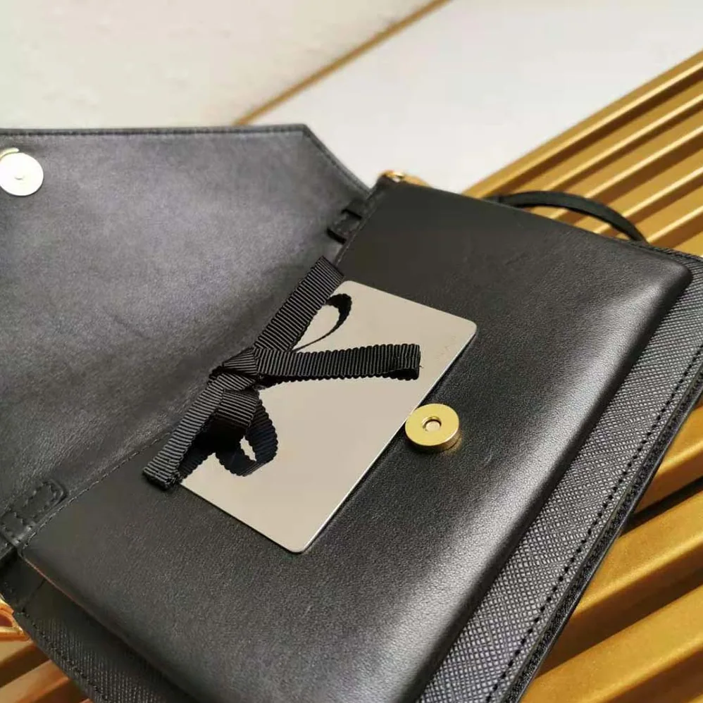 Prada Ladies Saffiano Leather Mini Bag in Black Prada Ladies Saffiano Leather Mini Bag in Black