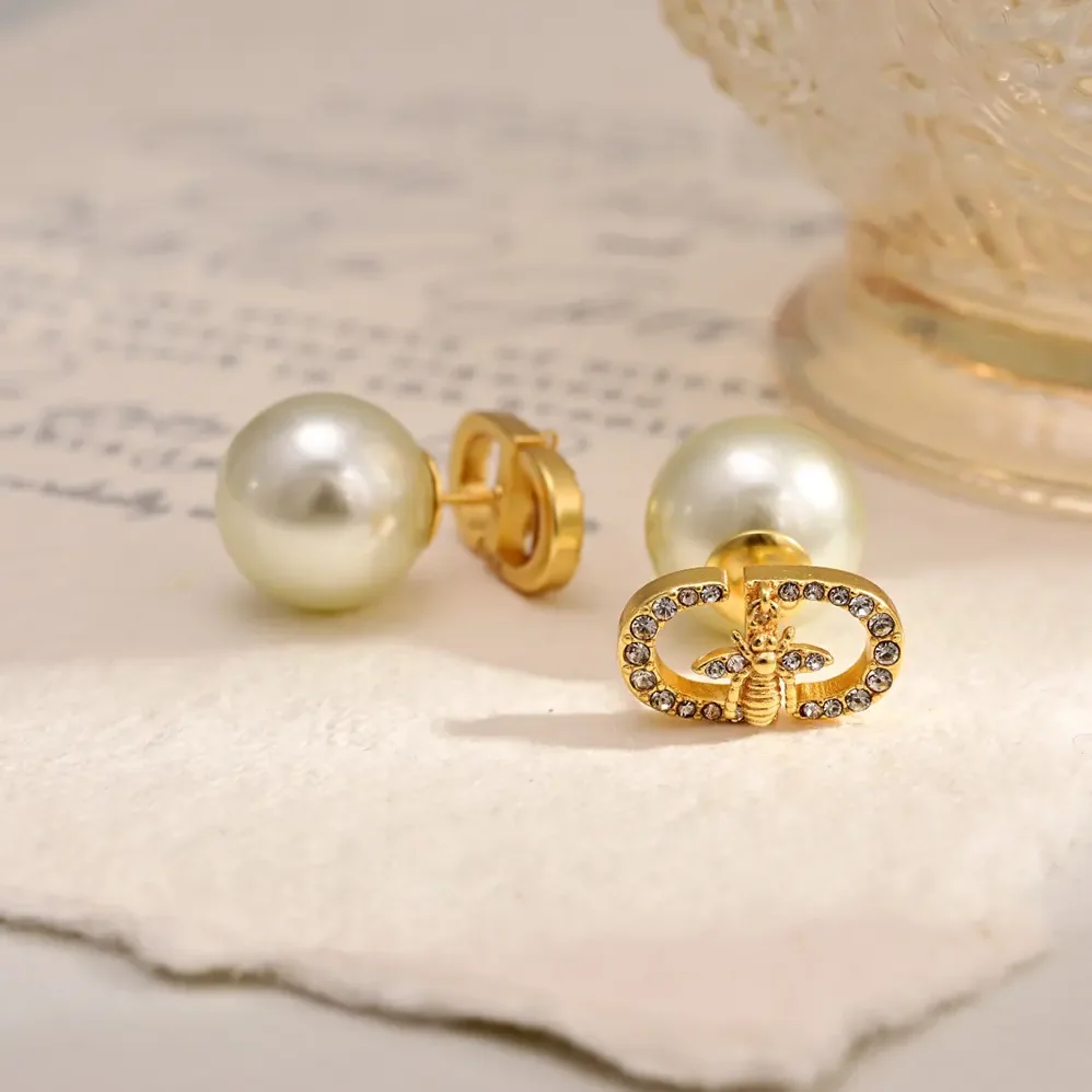 Dior Tribales Earrings Gold-Finish Metal with White Resin Pearls for Women Dior Tribales Earrings Gold-Finish Metal with White Resin Pearls for Women