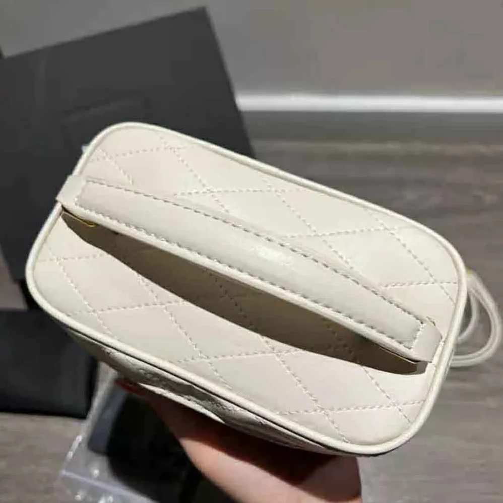 Saint Laurent YSL Mini Saint Laurent Vanity Case in Quilted Lambskin for Women in White Saint Laurent YSL Mini Saint Laurent Vanity Case in Quilted Lambskin for Women in White