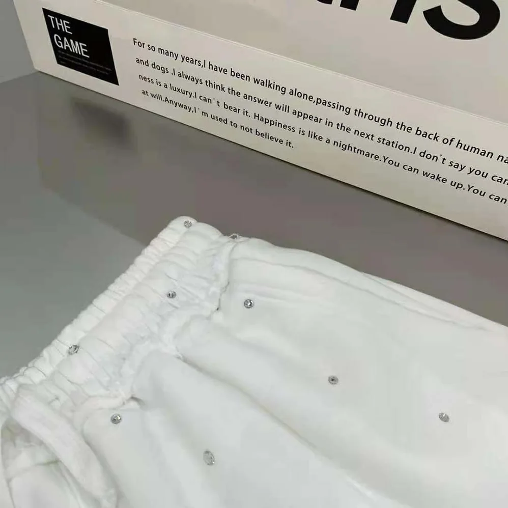 Miu Miu Embroidered Cotton Shorts with Embroidered Logo for Women in White