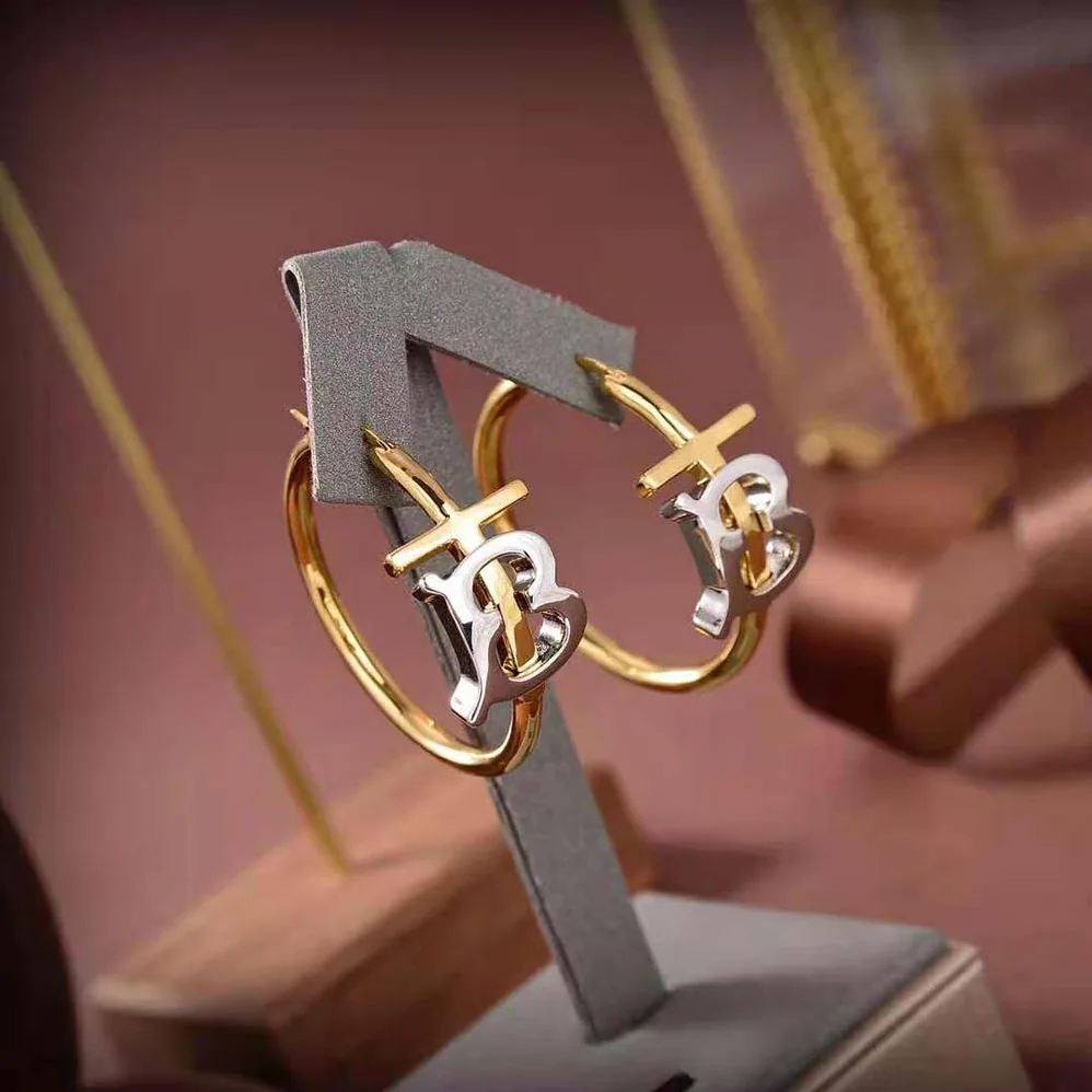 Burberry Gold and Palladium for Women in plated Monogram Motif Earrings Burberry Gold and Palladium for Women in plated Monogram Motif Earrings
