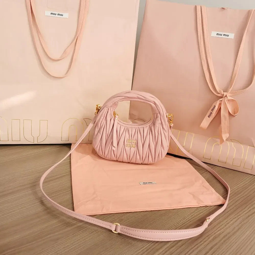 Miu Miu Wander Matelassé Nappa Leather Hobo Mini-Bag for Women in Powder Pink