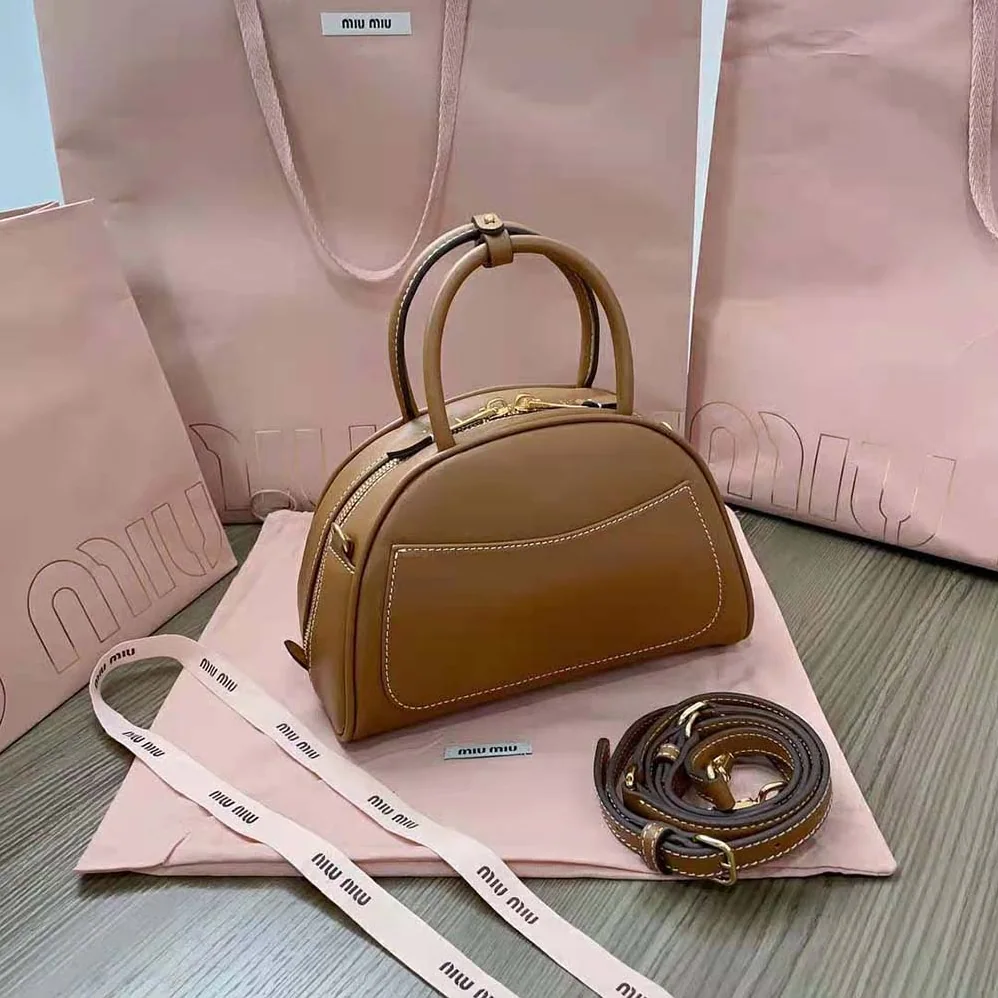 Miu Miu Medium Leather Top-handle Bag for Women in Brown