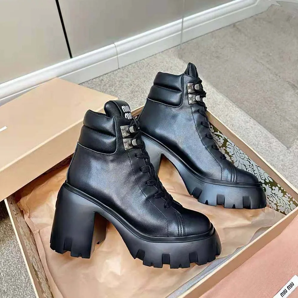 Miu Miu Leather Booties with EVA Sole with Logo for Women in Black Miu Miu Leather Booties with EVA Sole with Logo for Women in Black