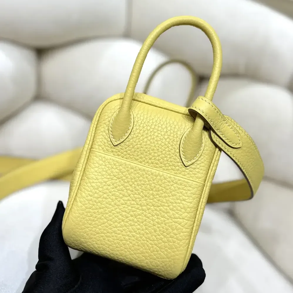 Hermes Lindy Mini 19 in Clemence Leather for Women in Yellow/Gold Hermes Lindy Mini 19 in Clemence Leather for Women in Yellow/Gold