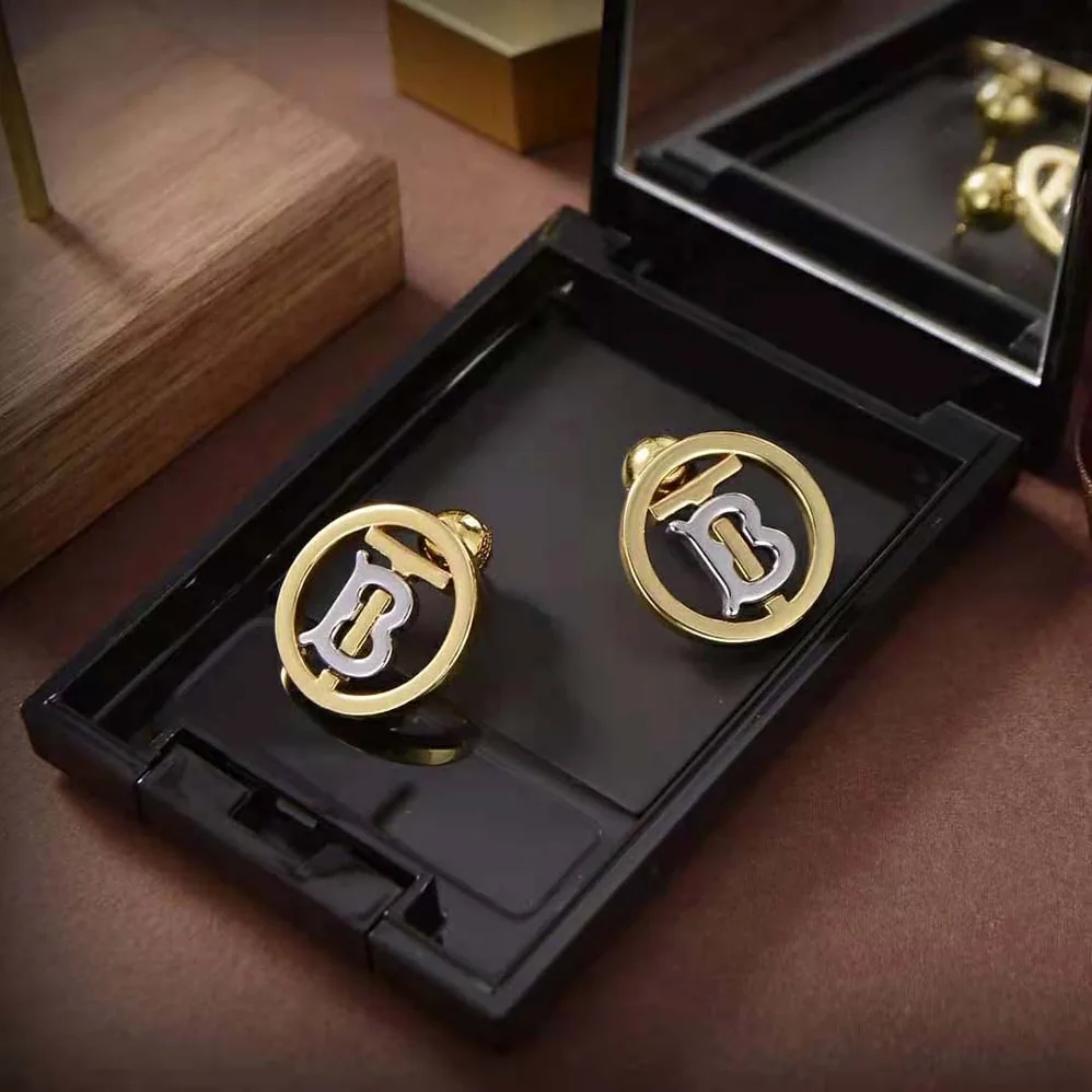 Burberry Gold and Palladium for Women in plated Monogram Motif Earrings Burberry Gold and Palladium for Women in plated Monogram Motif Earrings