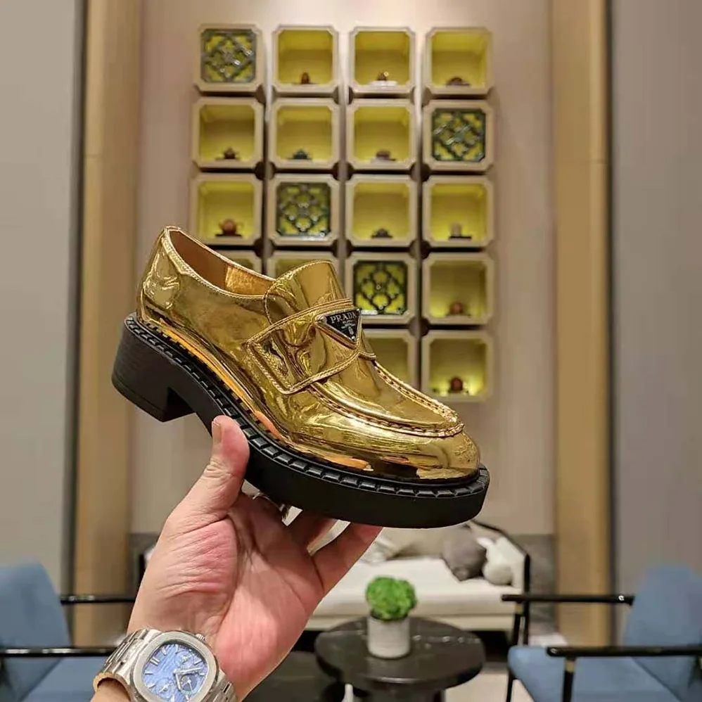 Prada Metallic Leather Loafers for Women in Gold