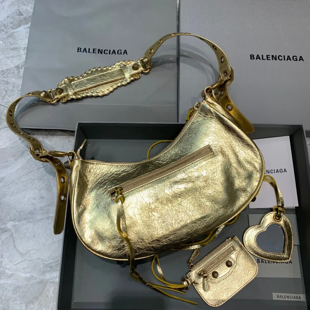 Balenciaga Le Cagole XS Shoulder Bag In Gold