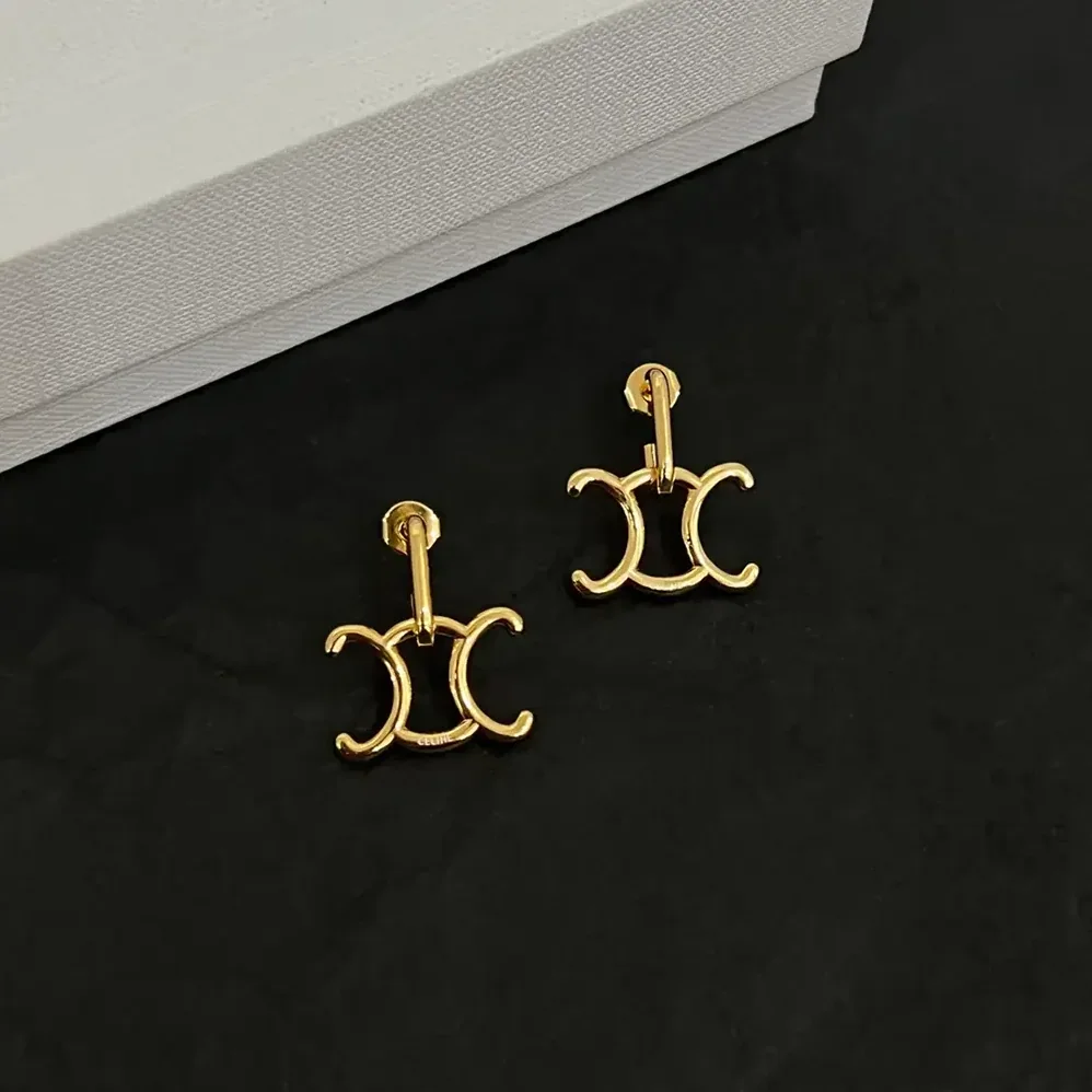 Celine Triomphe Lock Earrings in Brass with Gold Finish for Women in Gold Celine Triomphe Lock Earrings in Brass with Gold Finish for Women in Gold