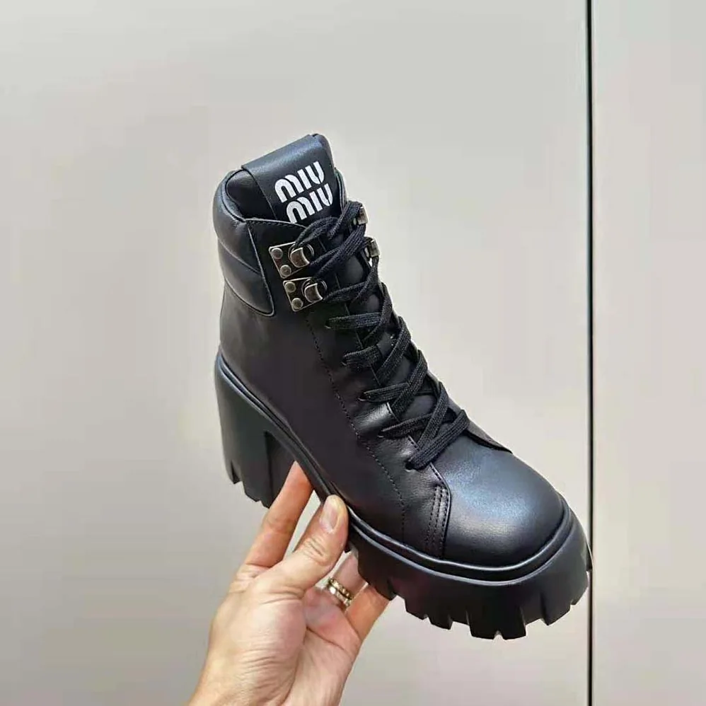 Miu Miu Leather Booties with EVA Sole with Logo for Women in Black Miu Miu Leather Booties with EVA Sole with Logo for Women in Black