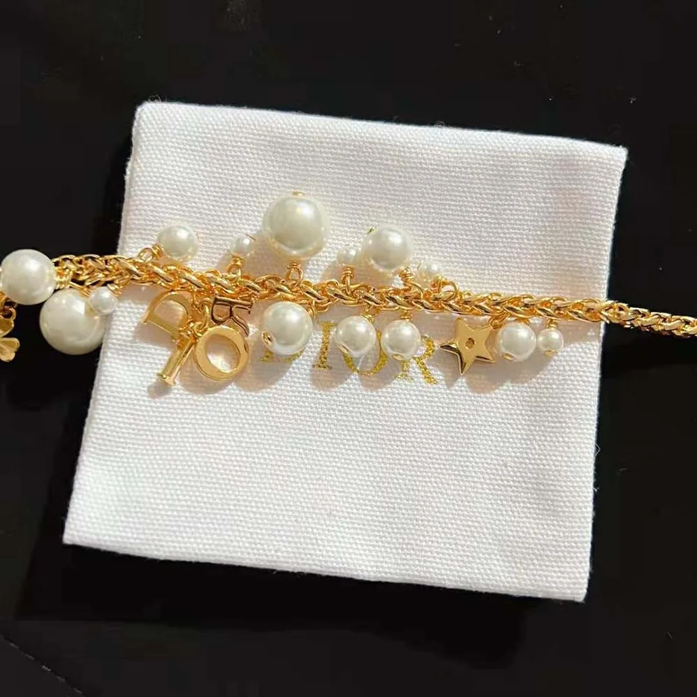 Dior Dio(r)evolution Necklace Gold-Finish Metal and White Resin Pearls for Women Dior Dio(r)evolution Necklace Gold-Finish Metal and White Resin Pearls for Women