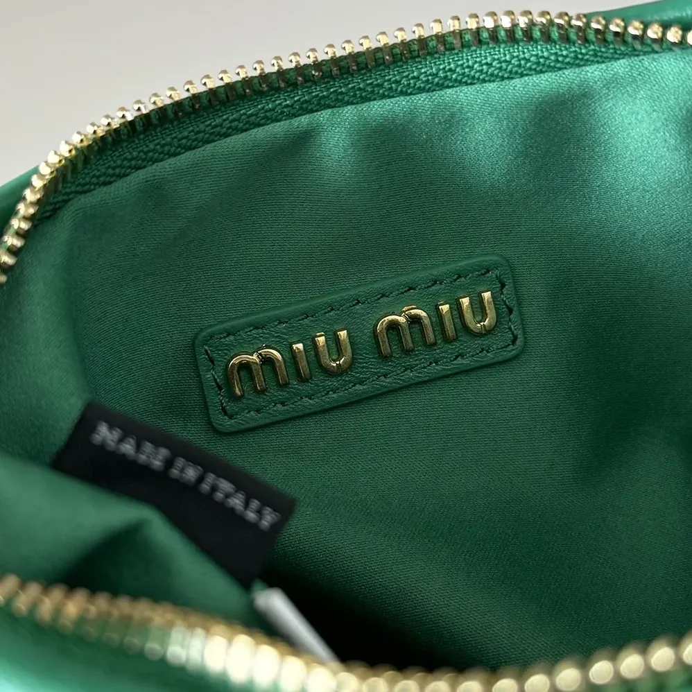 Miu Miu Wander Matelassé Nappa Leather Hobo Bag for Women in Green Miu Miu Wander Matelassé Nappa Leather Hobo Bag for Women in Green
