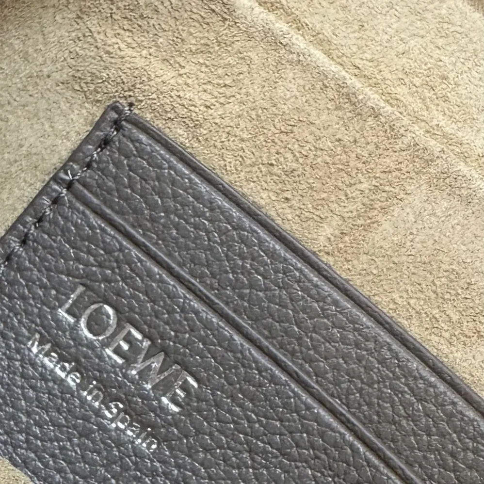 Loewe Small Pebble Messenger Bag in Supple Grained Calfskin for Unisex in Brown