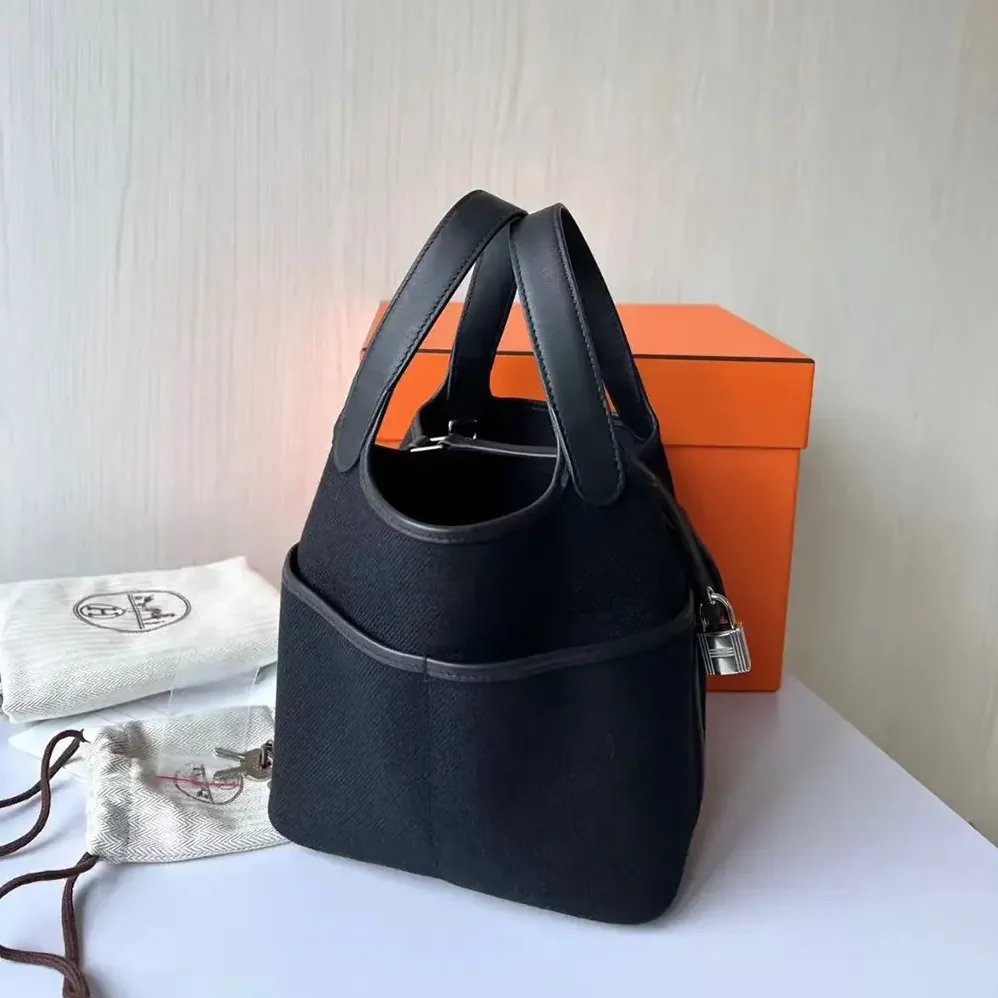 Hermes Picotin Lock 18 Pockets in Goeran Canvas Leather for Women in Black Hermes Picotin Lock 18 Pockets in Goeran Canvas Leather for Women in Black