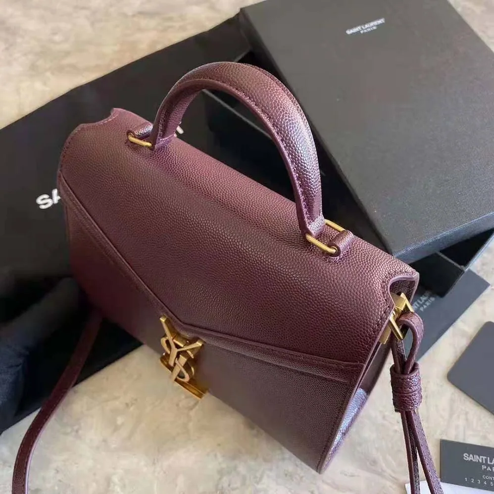 Saint Laurent YSL Cassandra Top Handle Medium Bag in Grain DE Poudre Embossed Leather for Women in Maroon