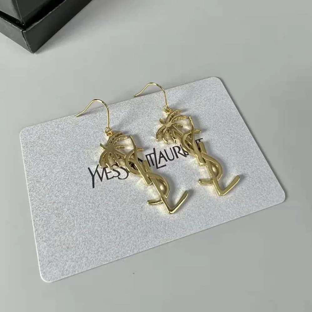 Saint Laurent YSL Monogram Palm Earrings in Metal for Women in Gold Saint Laurent YSL Monogram Palm Earrings in Metal for Women in Gold
