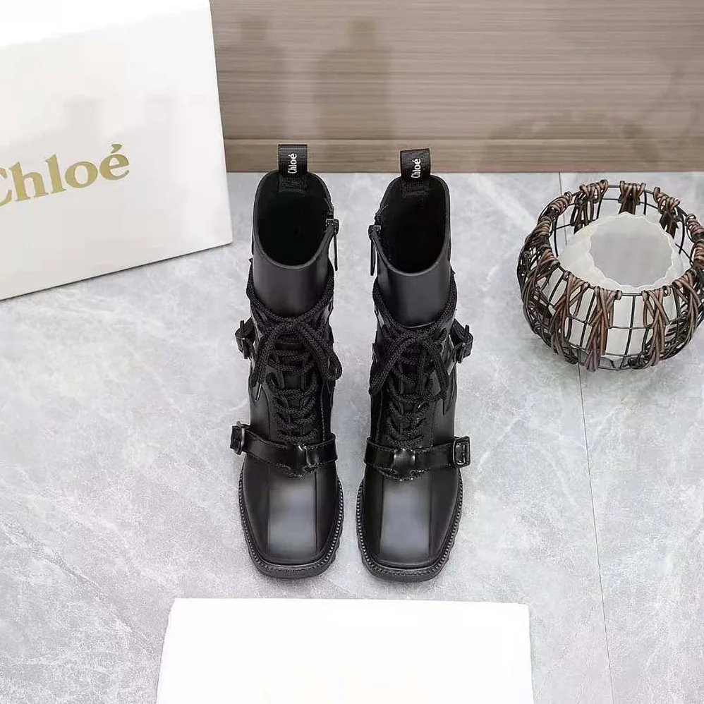 Chloe Harnessed Betty Rain Boot in PVC for Women in Black Chloe Harnessed Betty Rain Boot in PVC for Women in Black