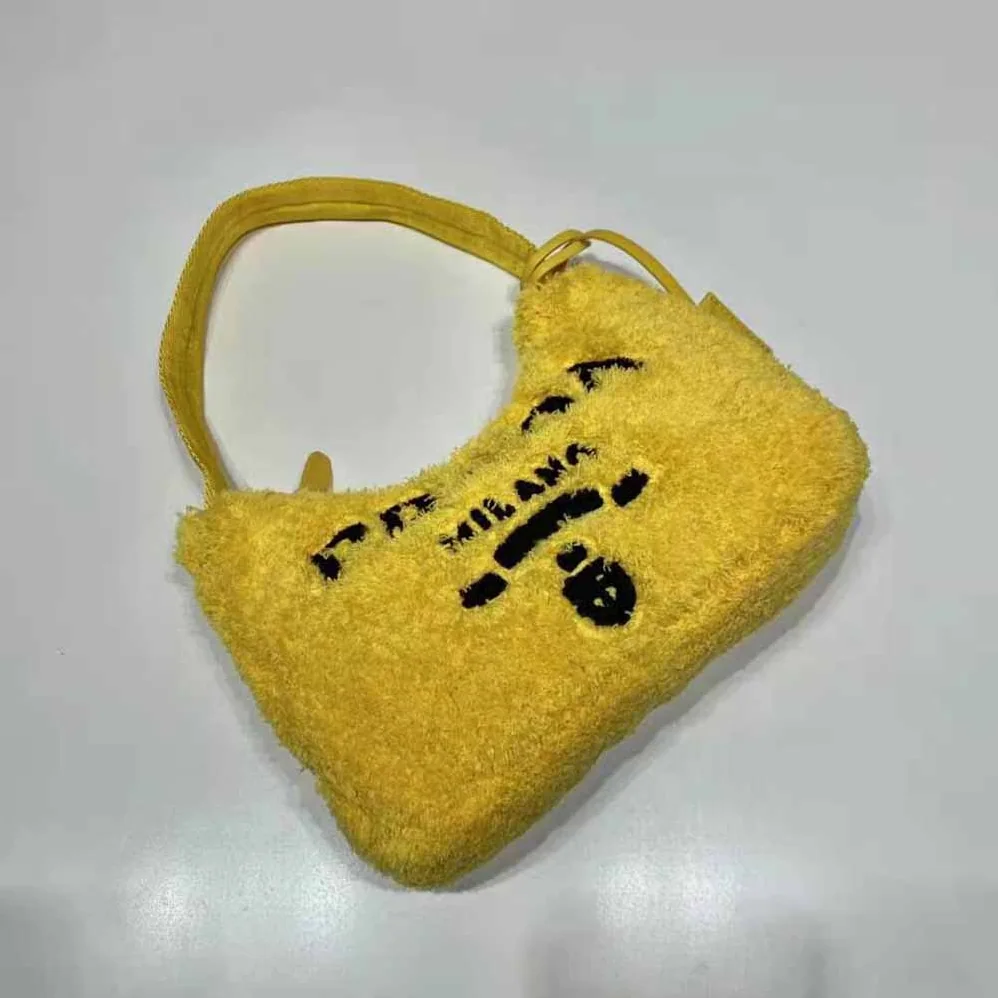 Prada Re-Edition 2000 Terry Mini-Bag for Women in Yellow Prada Re-Edition 2000 Terry Mini-Bag for Women in Yellow