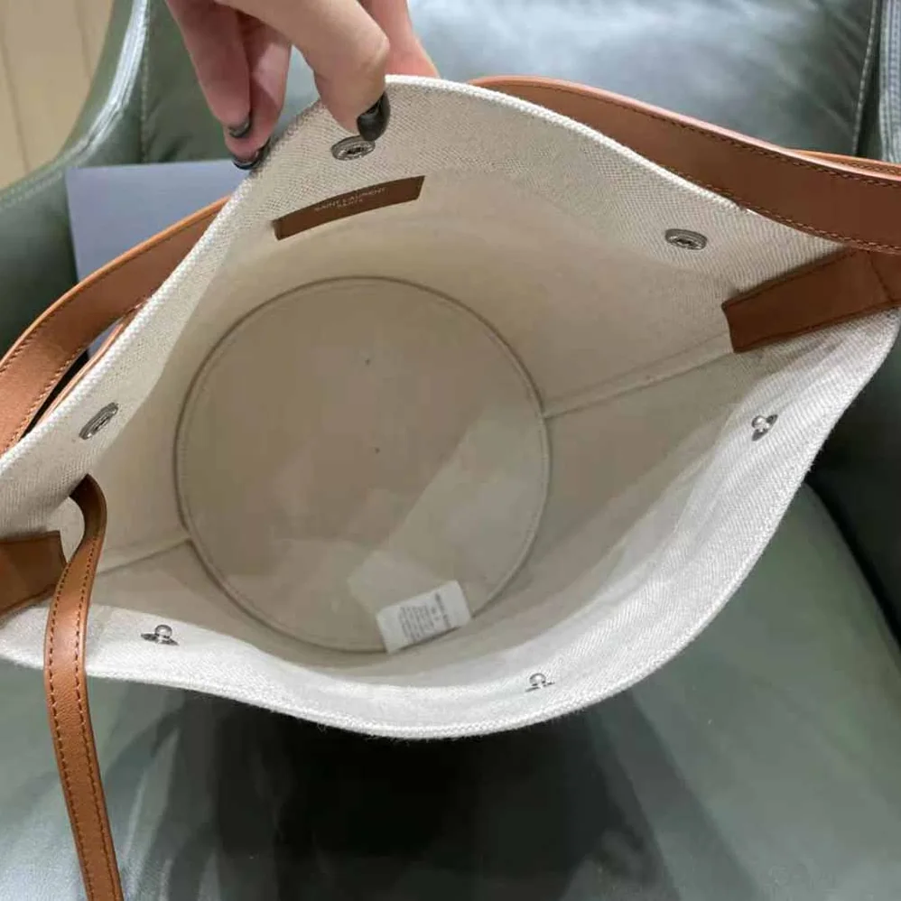 Saint Laurent YSL Rive Gauche Bucket Bag in Linen for Women in Brown