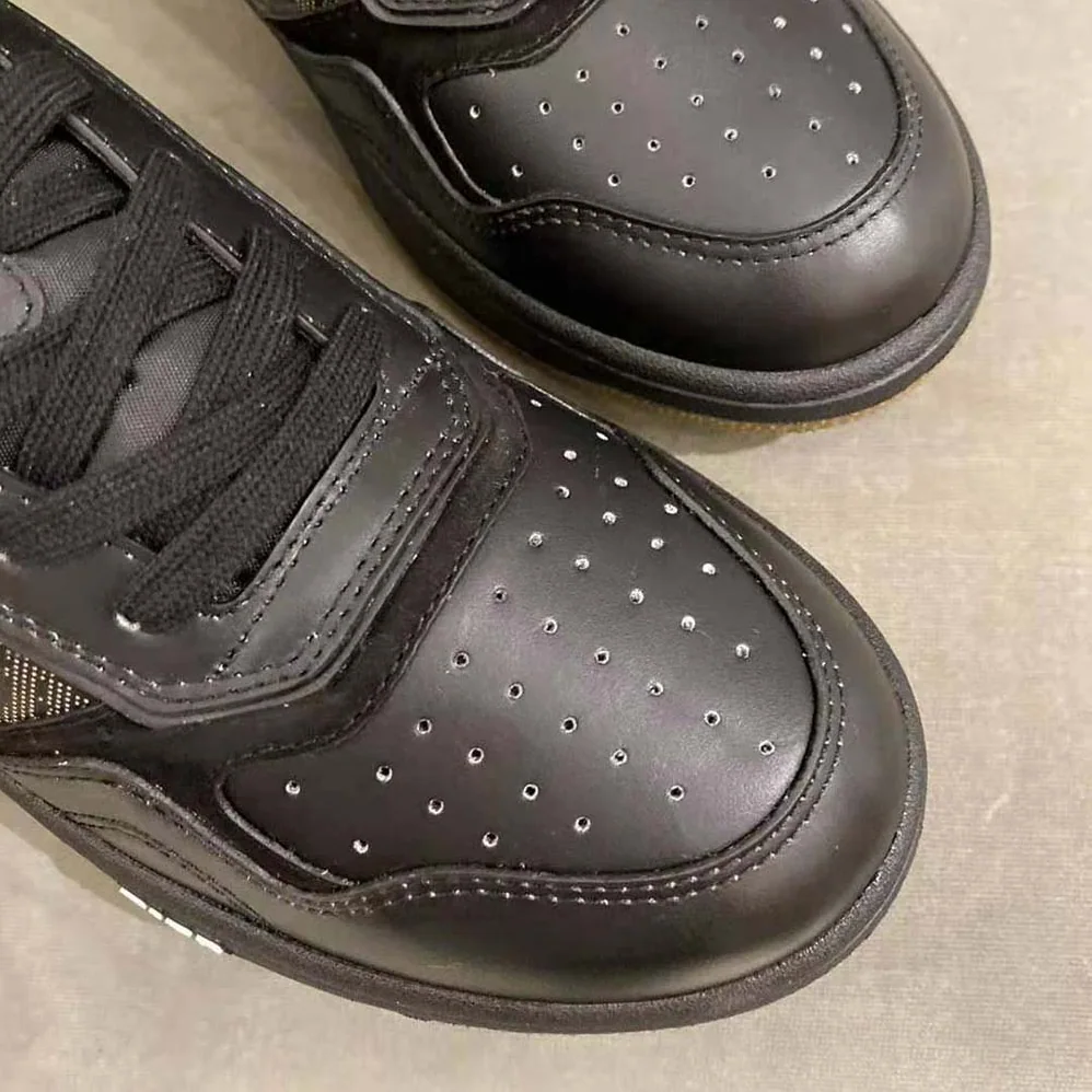 Dior World Tour B27 Low-Top Sneaker for Men in Black Dior World Tour B27 Low-Top Sneaker for Men in Black