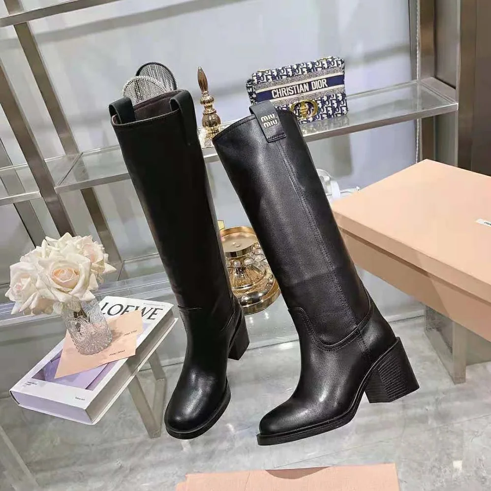 Miu Miu Leather Booties with Screen-printed Logo for Women in Black