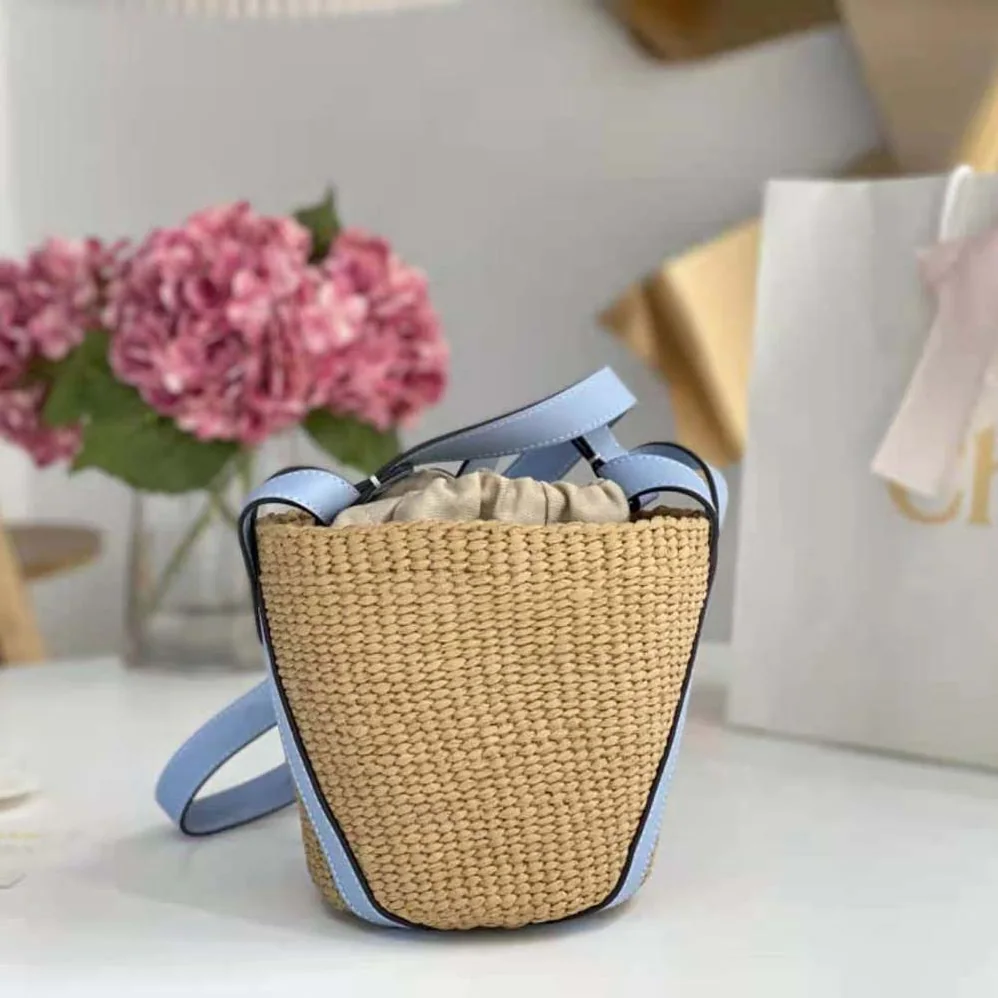 Chloe Small Basket in Fair-Trade Paper and Shiny Calfskin for Women in Blue Chloe Small Basket in Fair-Trade Paper and Shiny Calfskin for Women in Blue