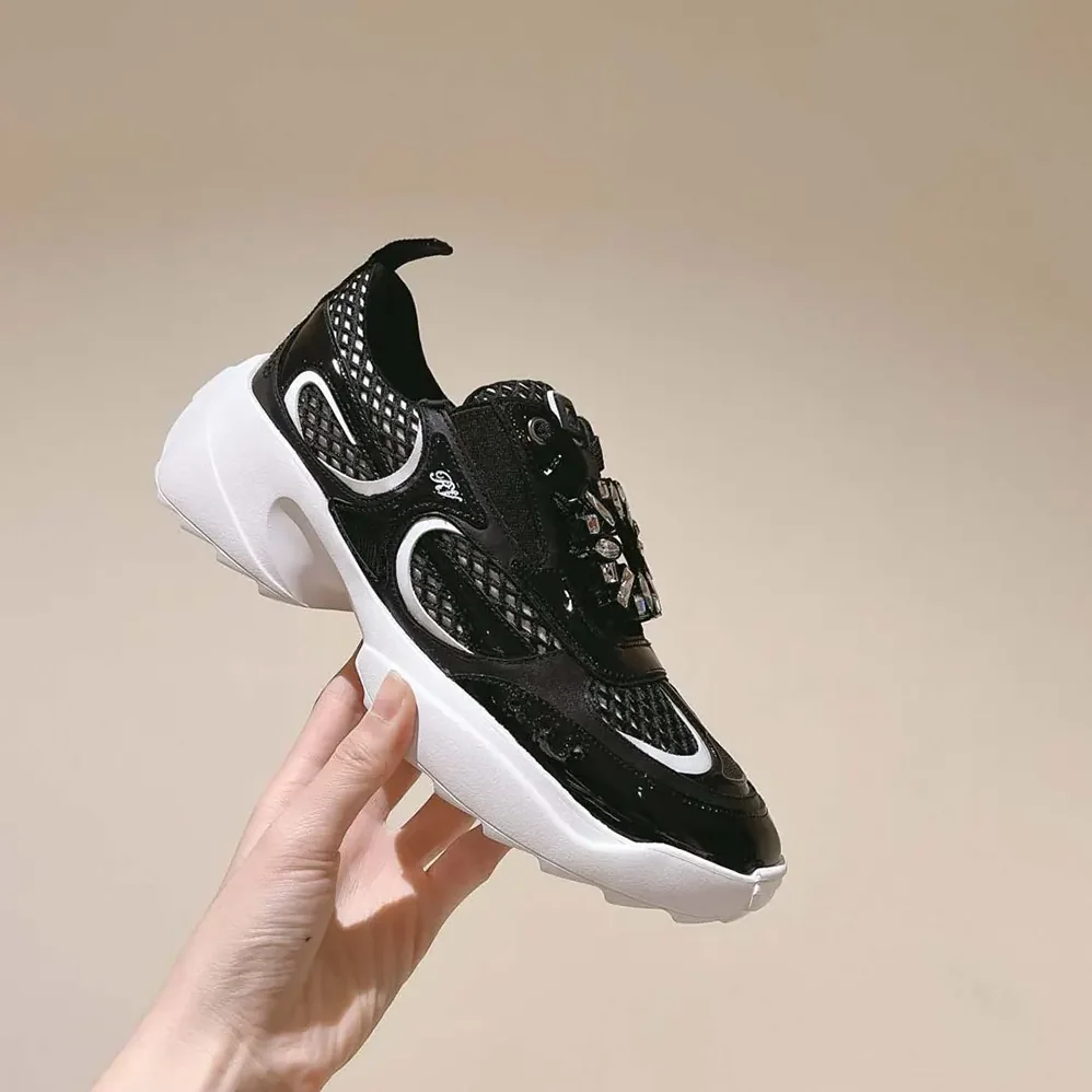 Roger Vivier Viv' on the Run Sneakers in Patent Leather and Fabric for Women in Black Roger Vivier Viv' on the Run Sneakers in Patent Leather and Fabric for Women in Black