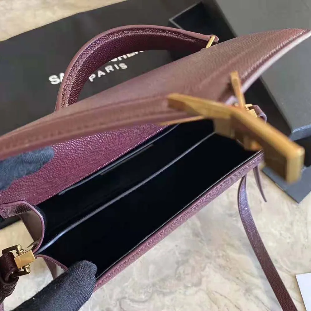 Saint Laurent YSL Cassandra Top Handle Medium Bag in Grain DE Poudre Embossed Leather for Women in Maroon