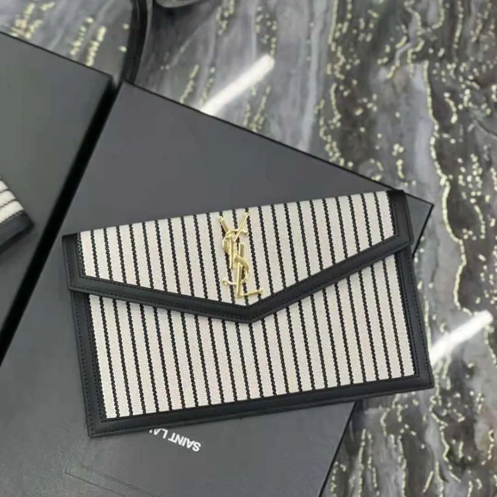 Saint Laurent YSL Uptown Pouch in Canvas and Smooth Leather for Women in Black