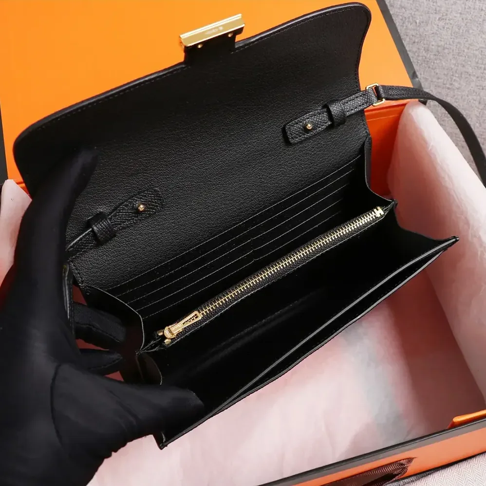 Hermes Constance Long To Go in Epsom Leather for Women in Black/Gold