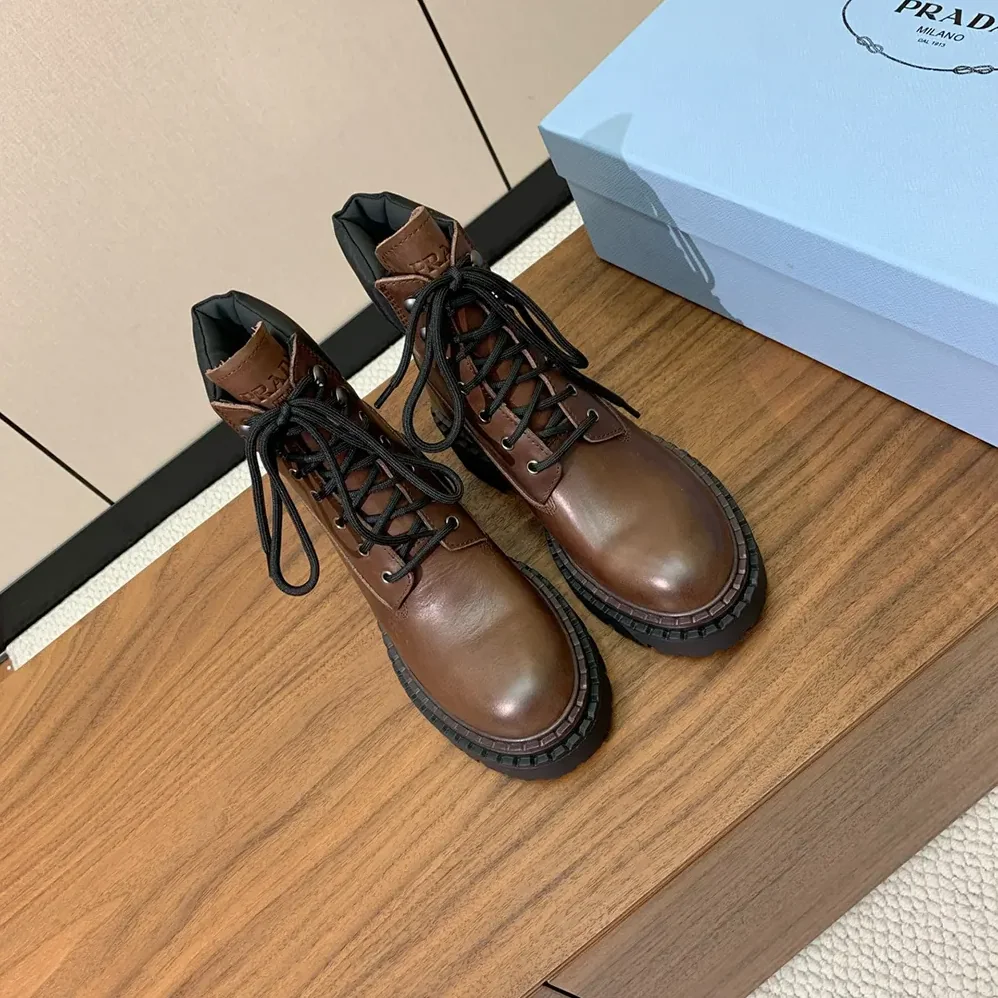 Prada Leather and Re-Nylon booties for Unisex in Cognac