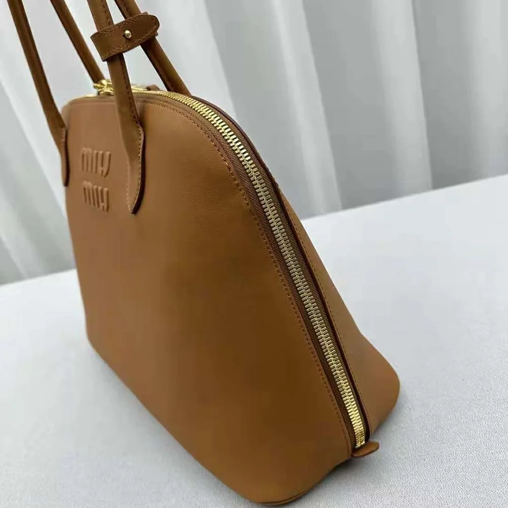 Miu Miu Leather Bag with Embossed Lettering Logo for Women in Brown Miu Miu Leather Bag with Embossed Lettering Logo for Women in Brown