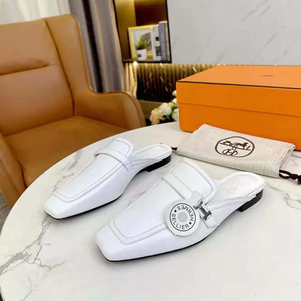 Hermes Groupie Mule in Goatskin with Miniature Palladium-Plated Paris Buckle for Women in White