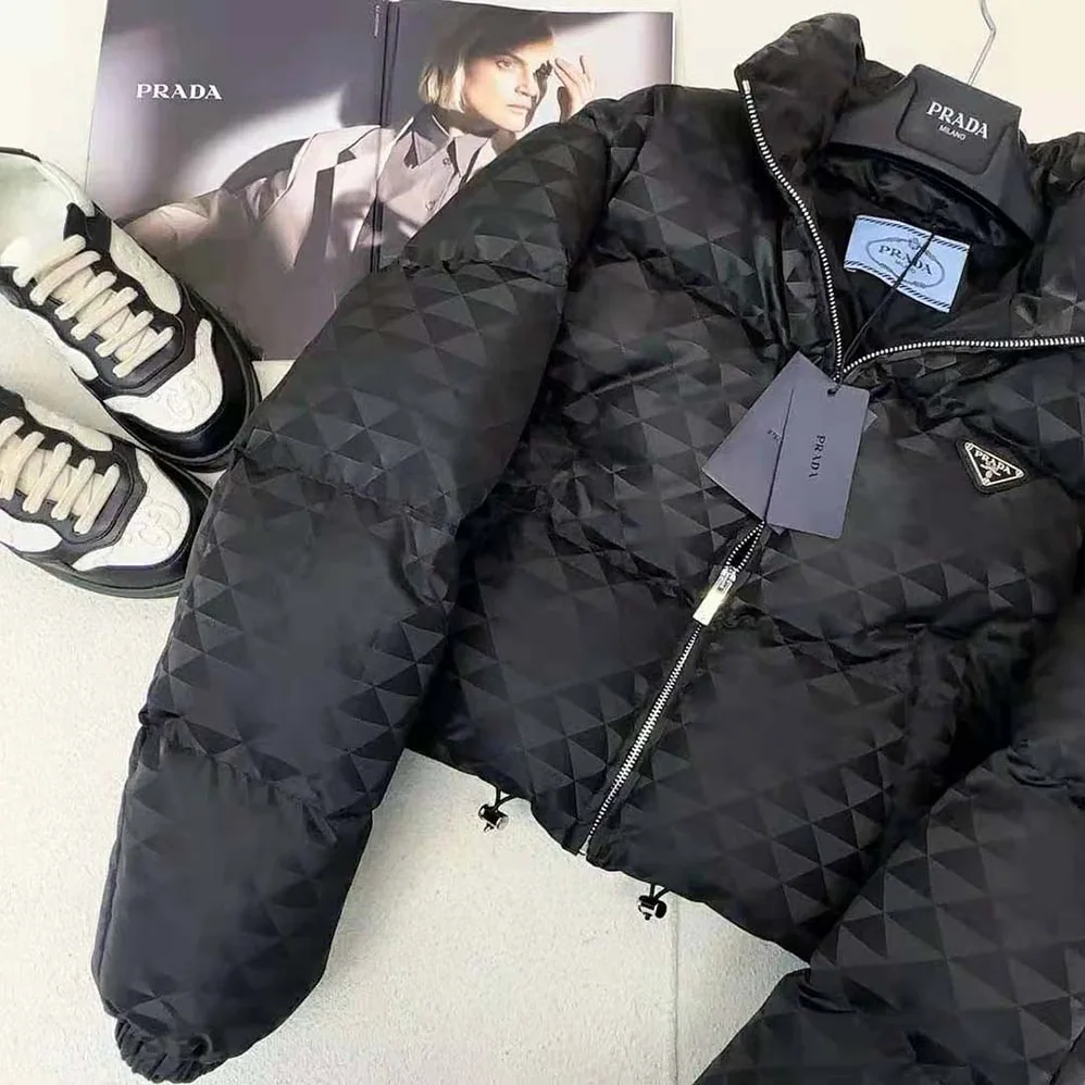 Prada Re-Nylon Cropped Hooded Down Jacket for Women in Black Prada Re-Nylon Cropped Hooded Down Jacket for Women in Black
