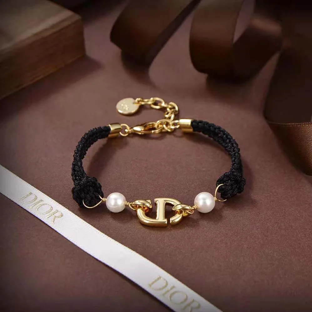 Dior CD Navy Bracelet Gold-Finish Metal with Black Cotton and White Resin Pearls for Women Dior CD Navy Bracelet Gold-Finish Metal with Black Cotton and White Resin Pearls for Women