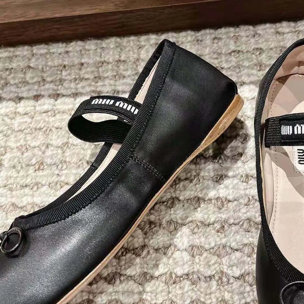 Miu Miu Leather Ballerinas with Fabric Logo Label for Women in Black