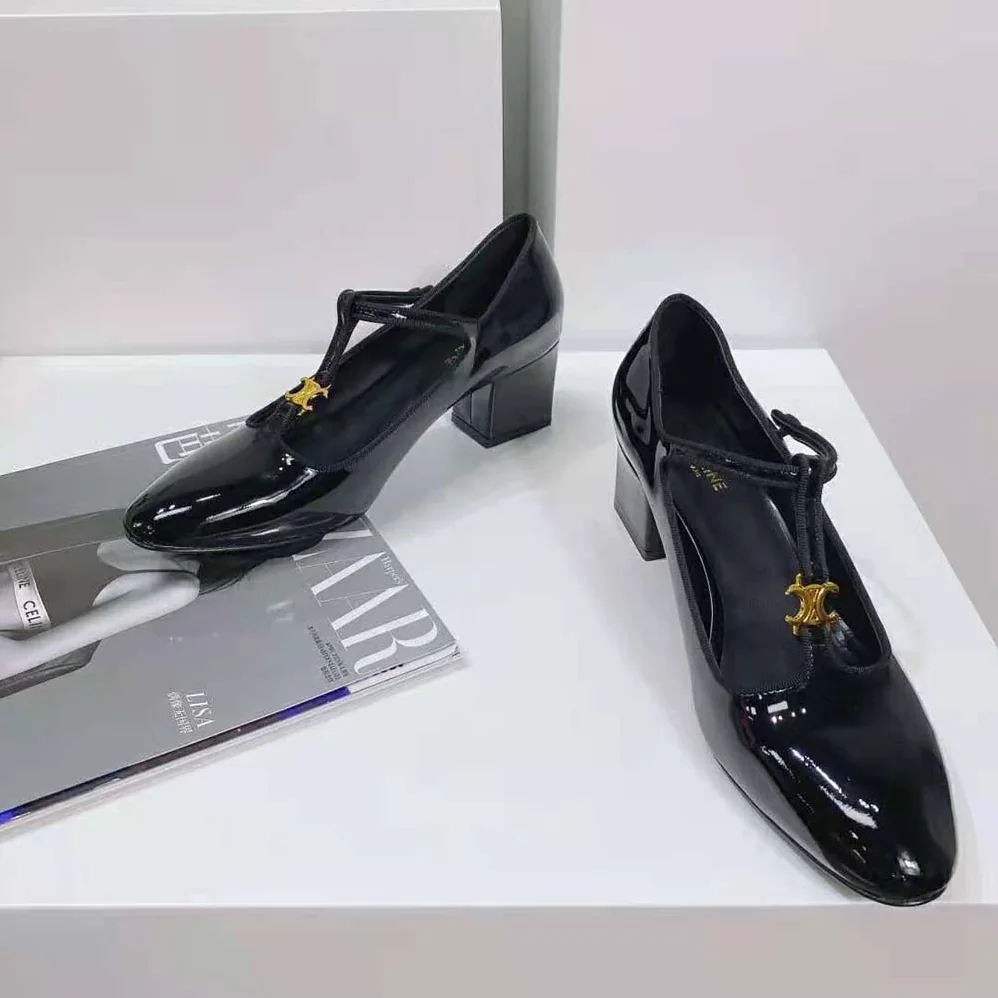 Celine Babies T-Bar Pump in Patent Calfskin and Grosgrain for Women in Black Celine Babies T-Bar Pump in Patent Calfskin and Grosgrain for Women in Black