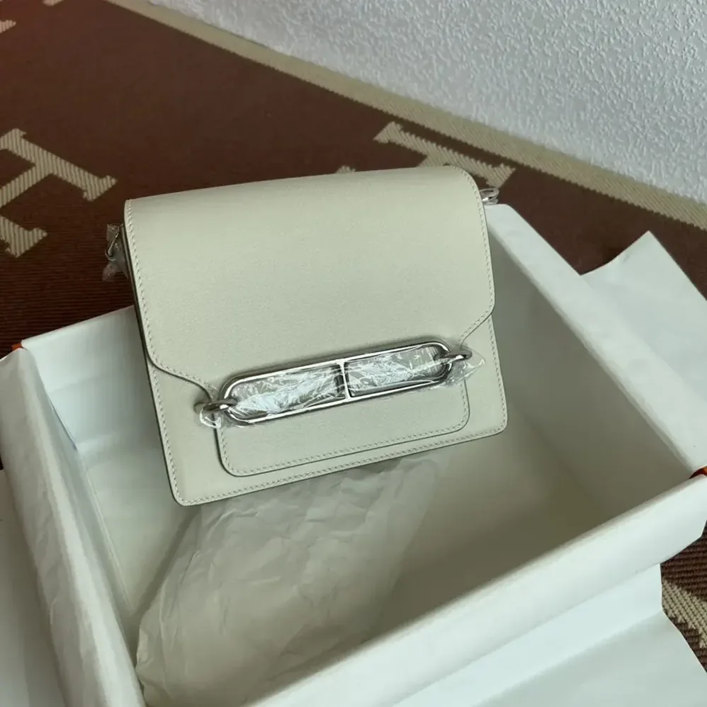 Hermes Roulis Mini Bag in Evercolor Calfskin for Women in White/Silver Hermes Roulis Mini Bag in Evercolor Calfskin for Women in White/Silver