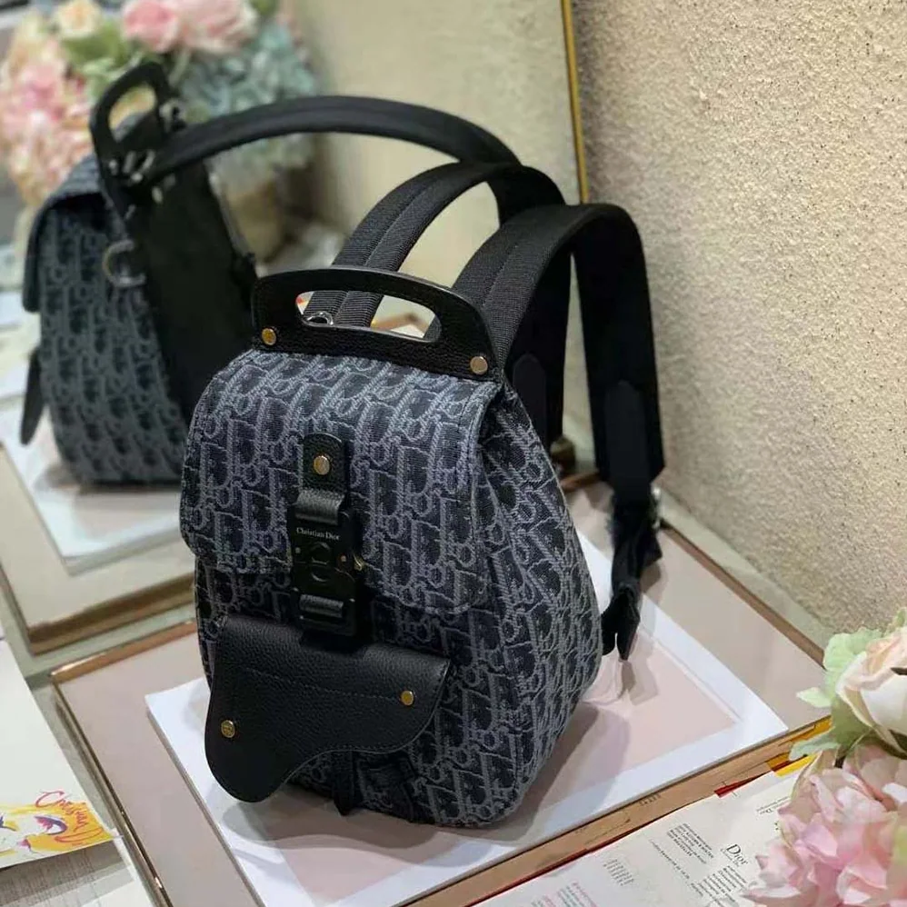 Dior Mini Saddle Backpack Dior Oblique Jacquard for Men in Black Dior Mini Saddle Backpack Dior Oblique Jacquard for Men in Black
