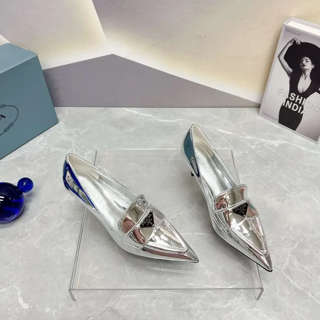 Prada Patent Pumps Silver